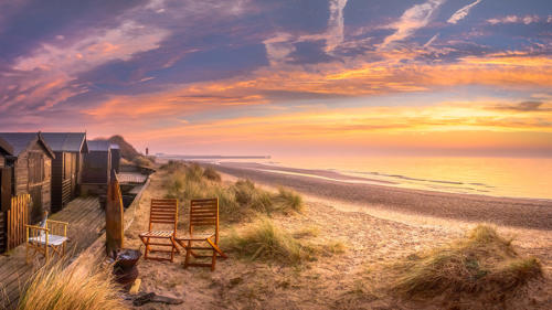 Walberswick Beach Huts Sunrise by Aron Radford